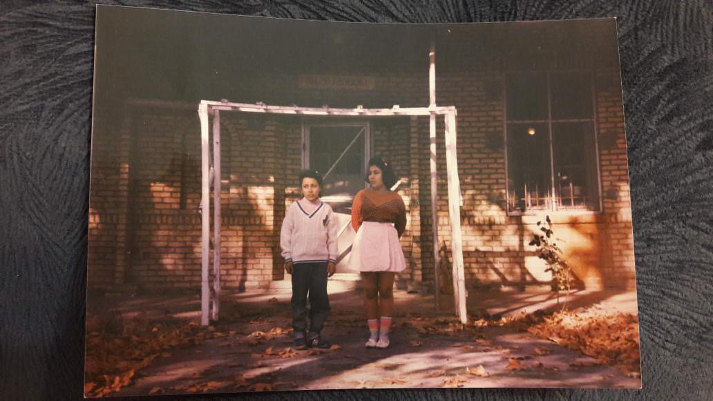 Atoosa as a child with her sister outside