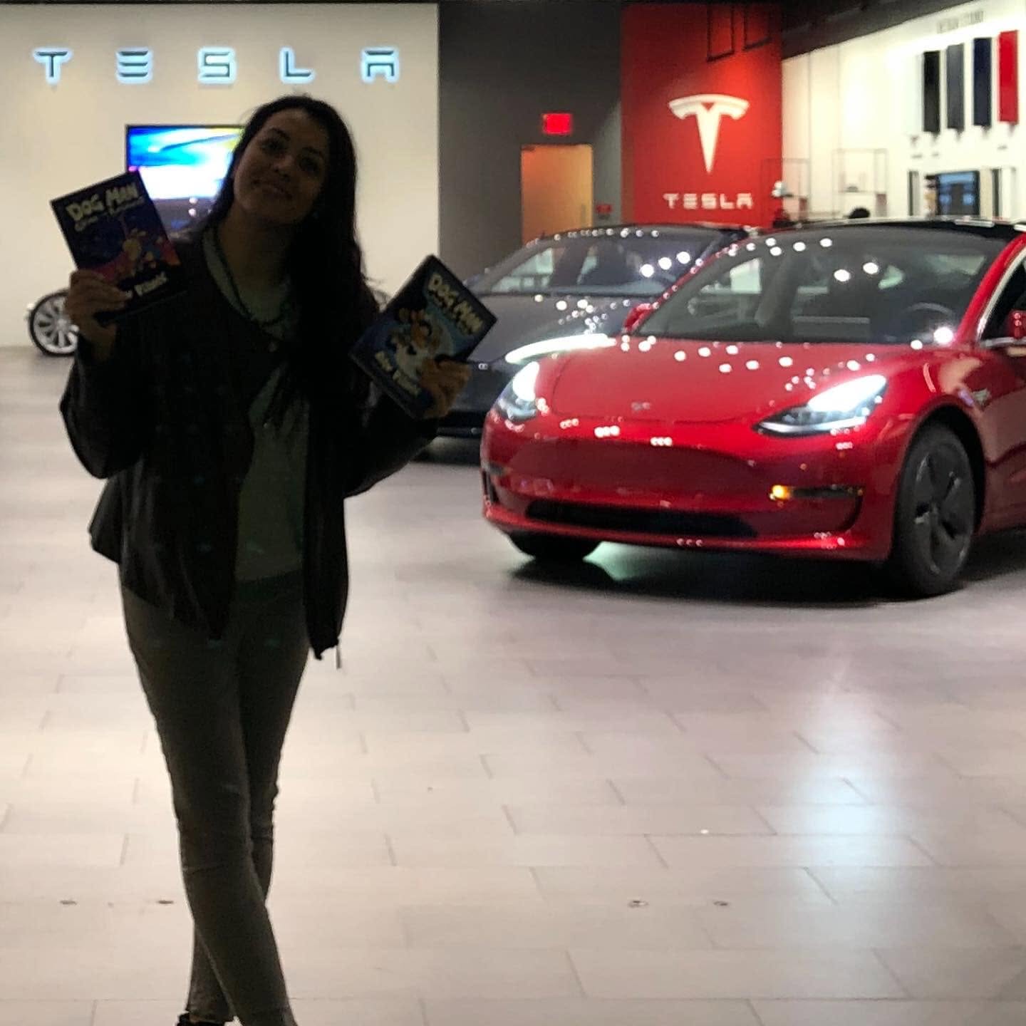 Atoosa with a Tesla